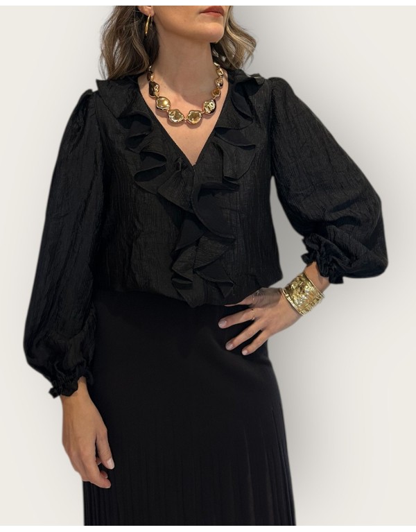 Blusa nera con volant e maniche a palloncino